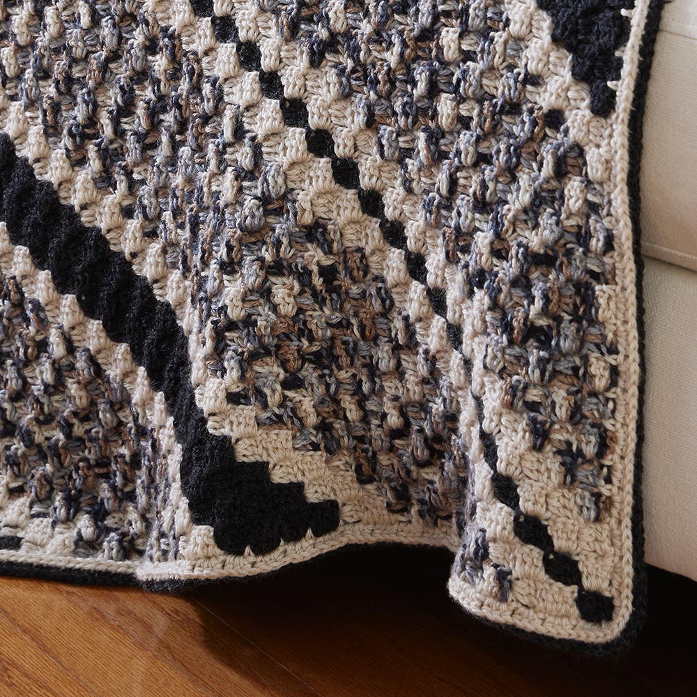 Jeté à rayures relaxantes