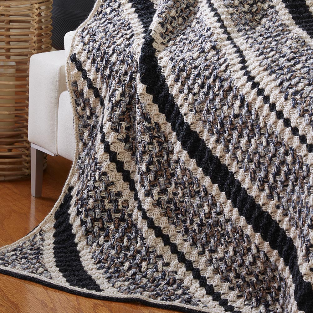 Jeté à rayures relaxantes