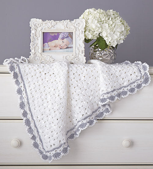 Manta de conchas brillantes