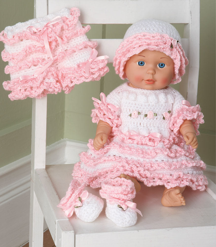 Patrón de muñeca bebé con volantes y cintas