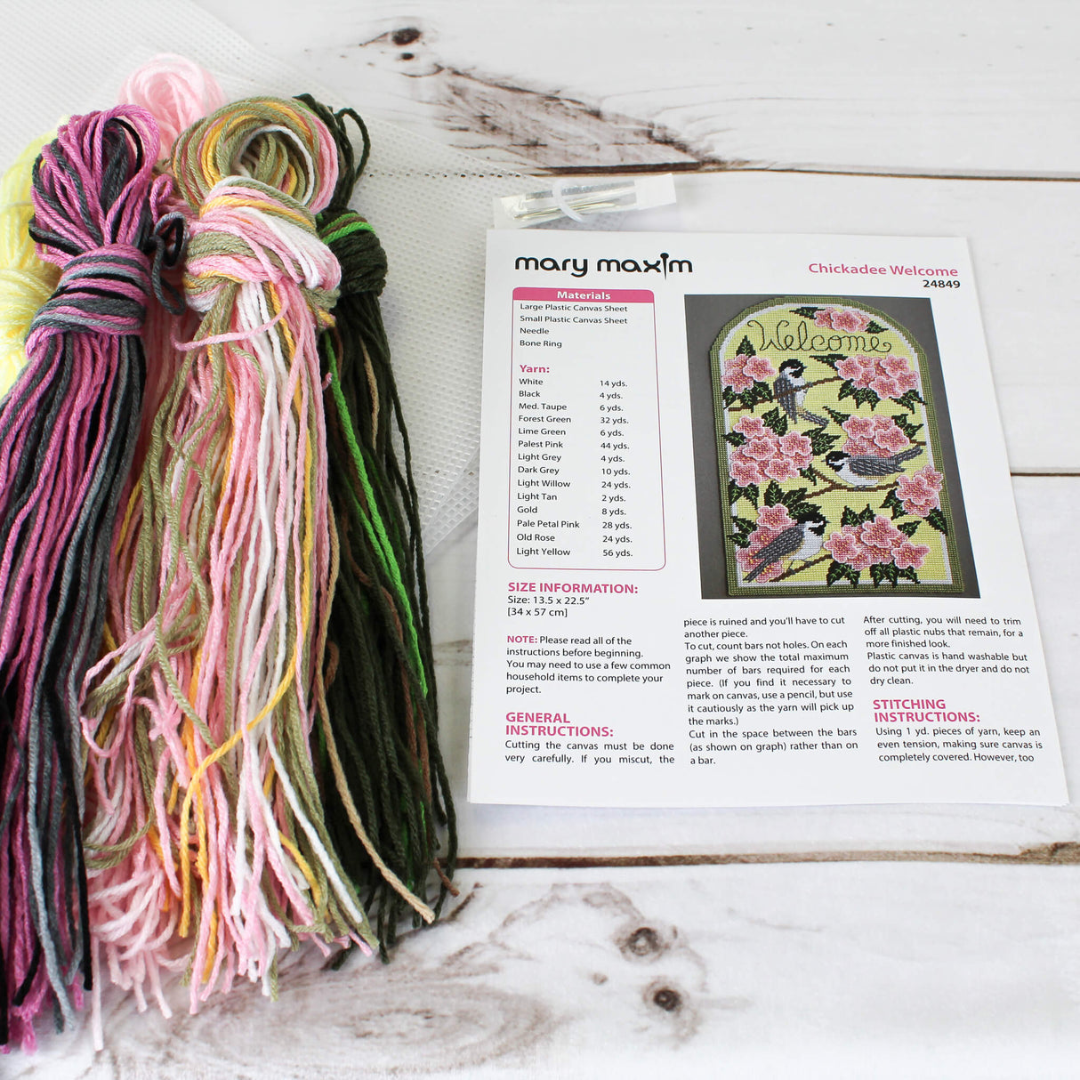 Chickadee Welcome Plastic Canvas Wall Hanging Pink Cherry Blossoms with 3 Chickadee's on branches against a yellow background