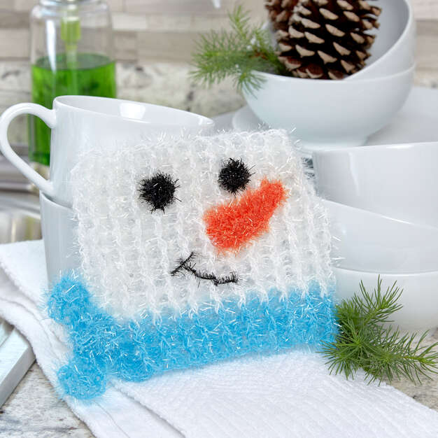 Muñeco de nieve gratis en el patrón de crochet cuadrado Scrubby
