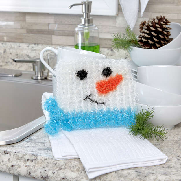 Muñeco de nieve gratis en el patrón de crochet cuadrado Scrubby