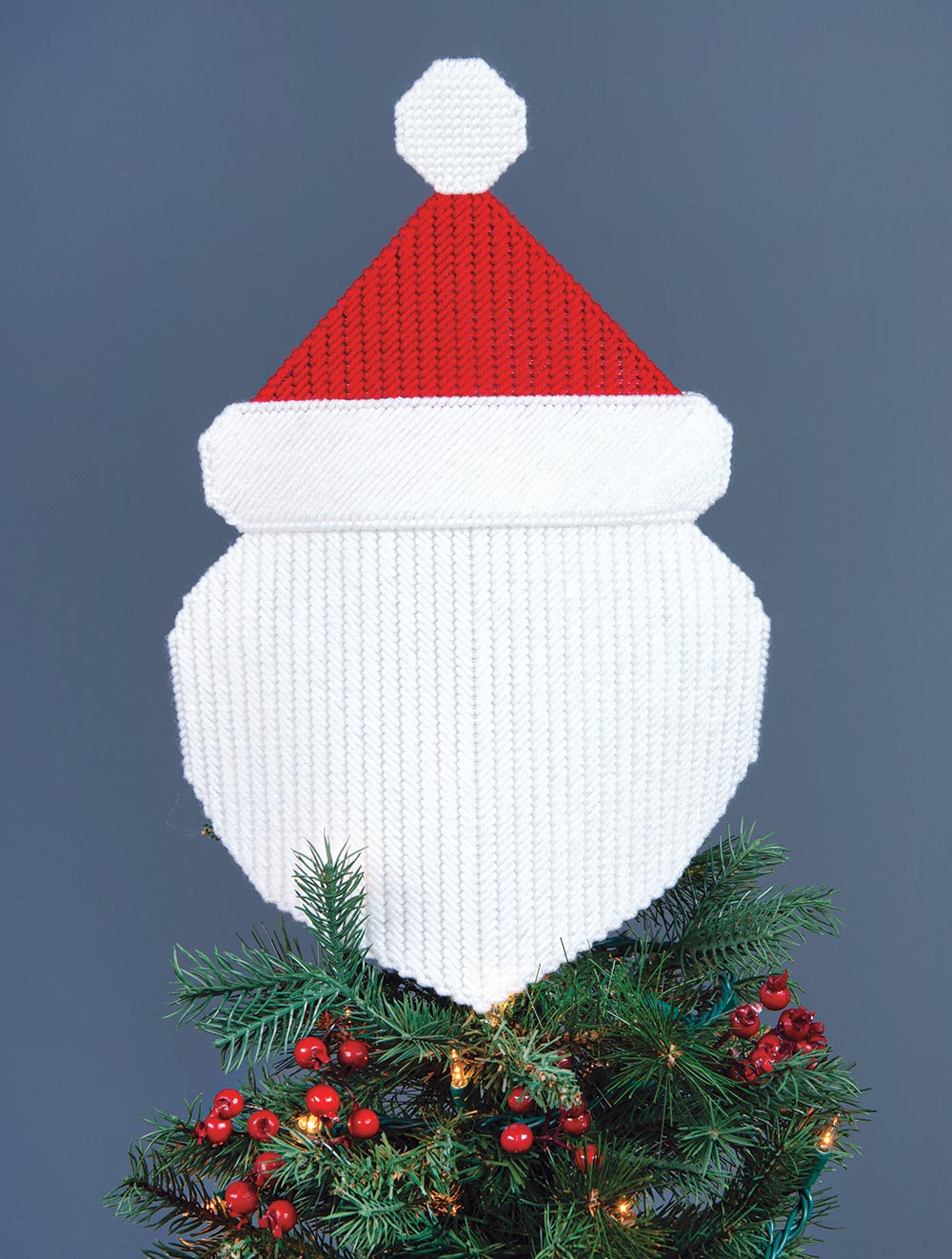 Cime d'arbre en toile en plastique du Père Noël