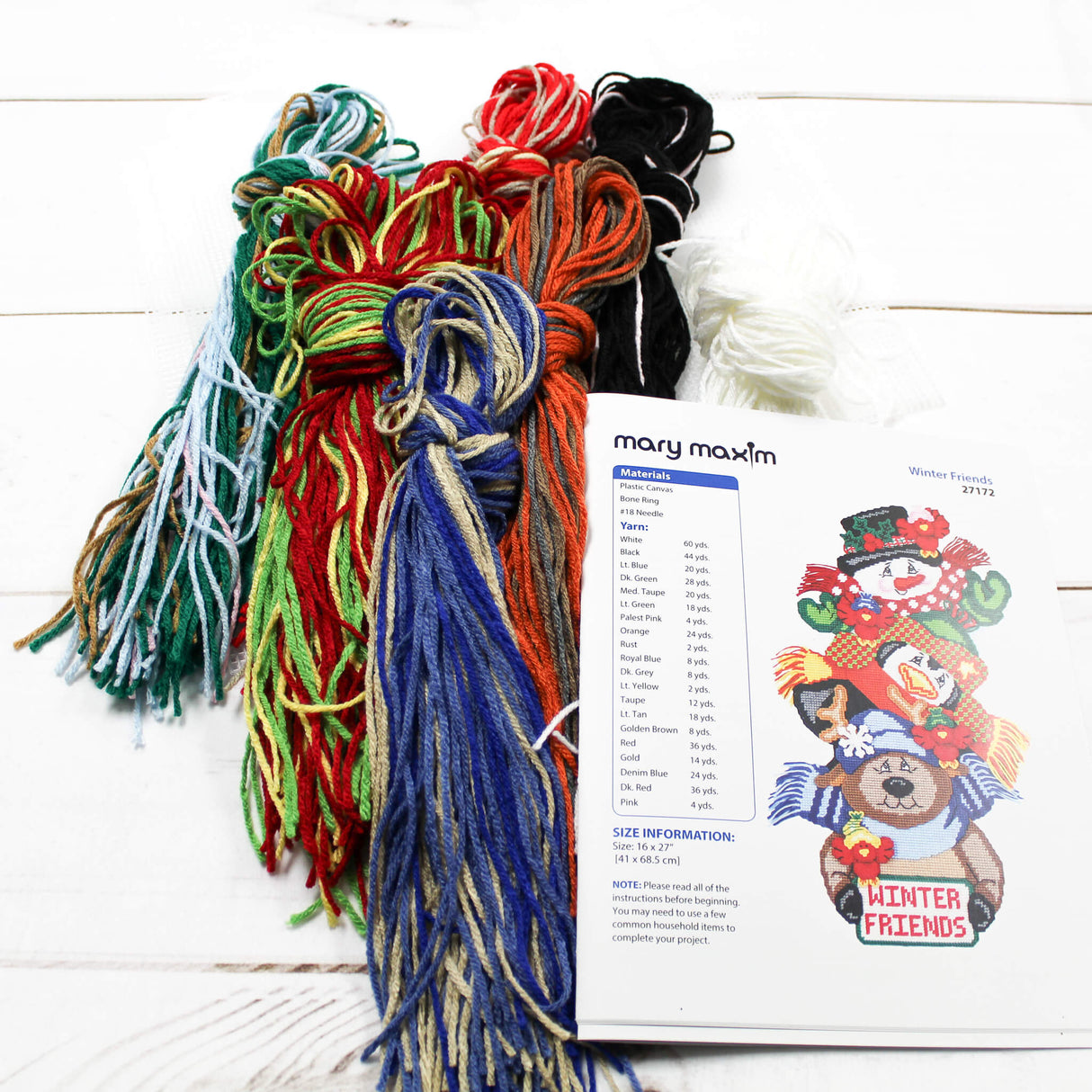 Stacked Snowman, Penguin, and Bear with scarves hats and mittens holding a red and green sign reading Winter Friends.