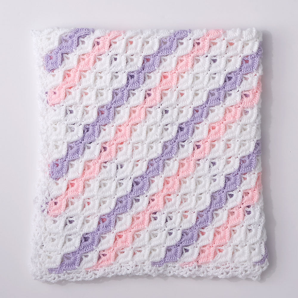 Manta de punto en caja