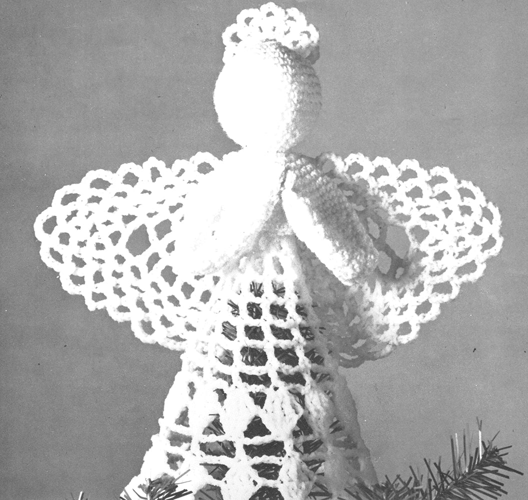 Patrón de ángel en la copa del árbol