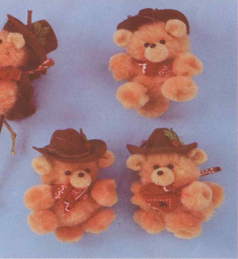 Modèle d'ours de cowboy à pompons