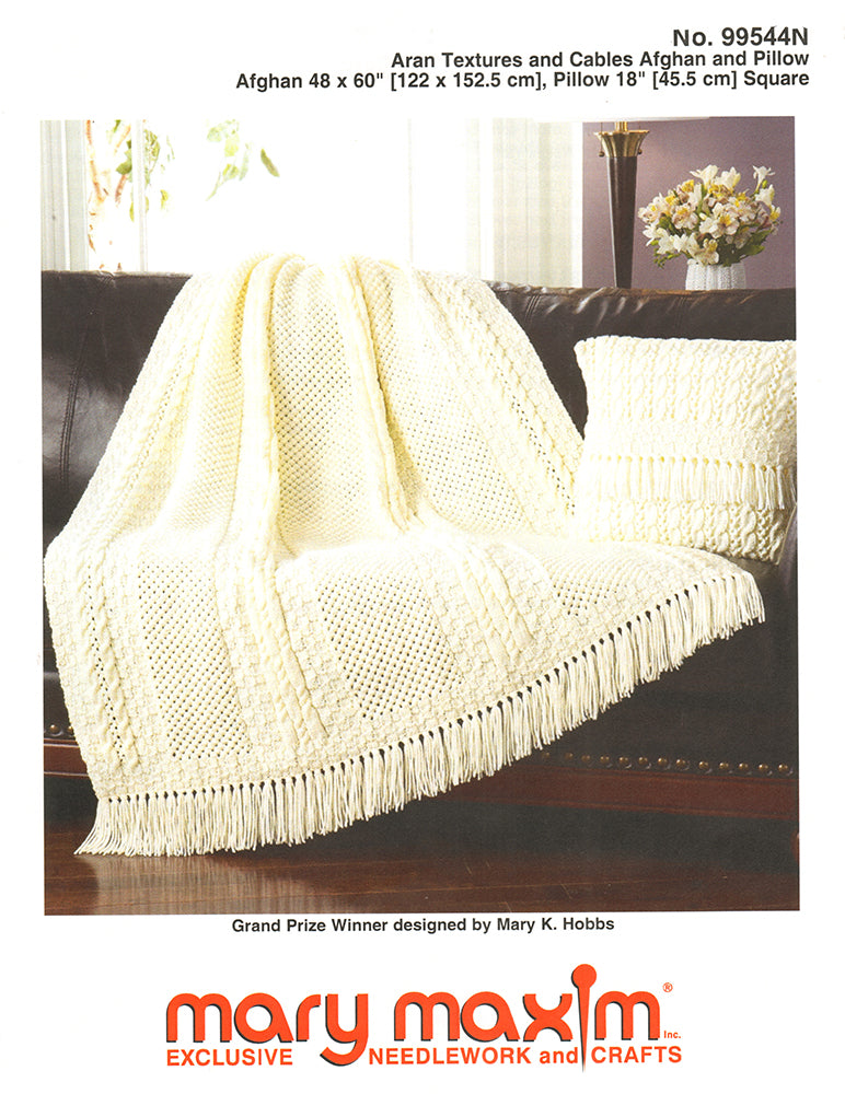 Textures et câbles Aran motif afghan et oreiller