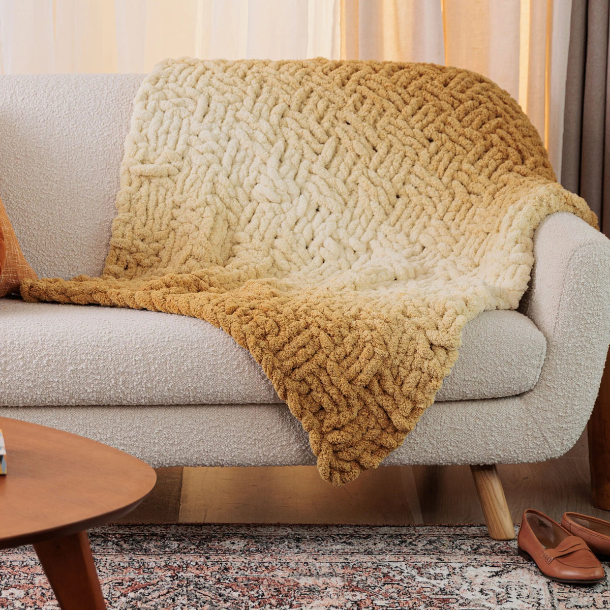 Free Bernat Woven Shift Table Knit Blanket Pattern